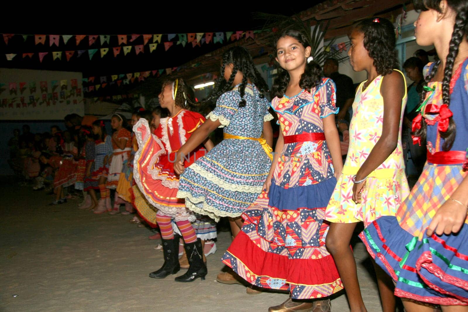 eunapolis, bahia / brazil - june 18, 2013: Eunapolis city public school students celebrate the festivities of Sao Joao, dancing gang.