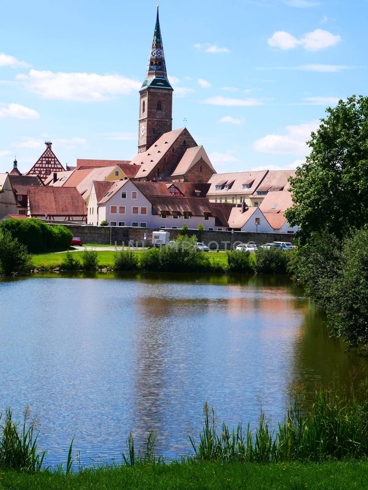 Wolframs-Eschenbach Liebfrauenmünster Church Cityscape Pond Schießweiher Ort City View Trees green Roof Roofs Sandstone Franconia Middle Franconia Bavaria Parking lot Church tower Ziegel Recreation 9163