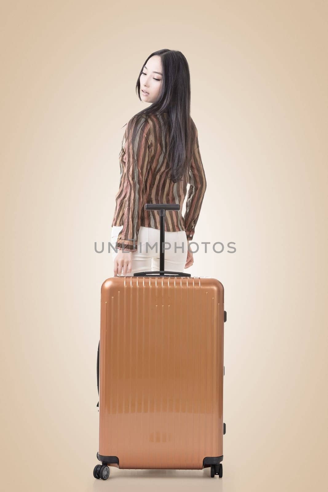 Modern Asian woman stand with a luggage.