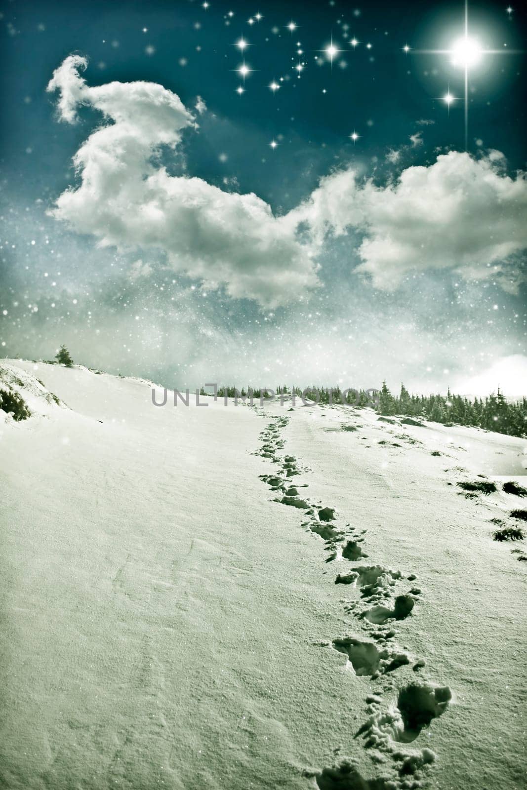Christmas background with snowy path on the hillside