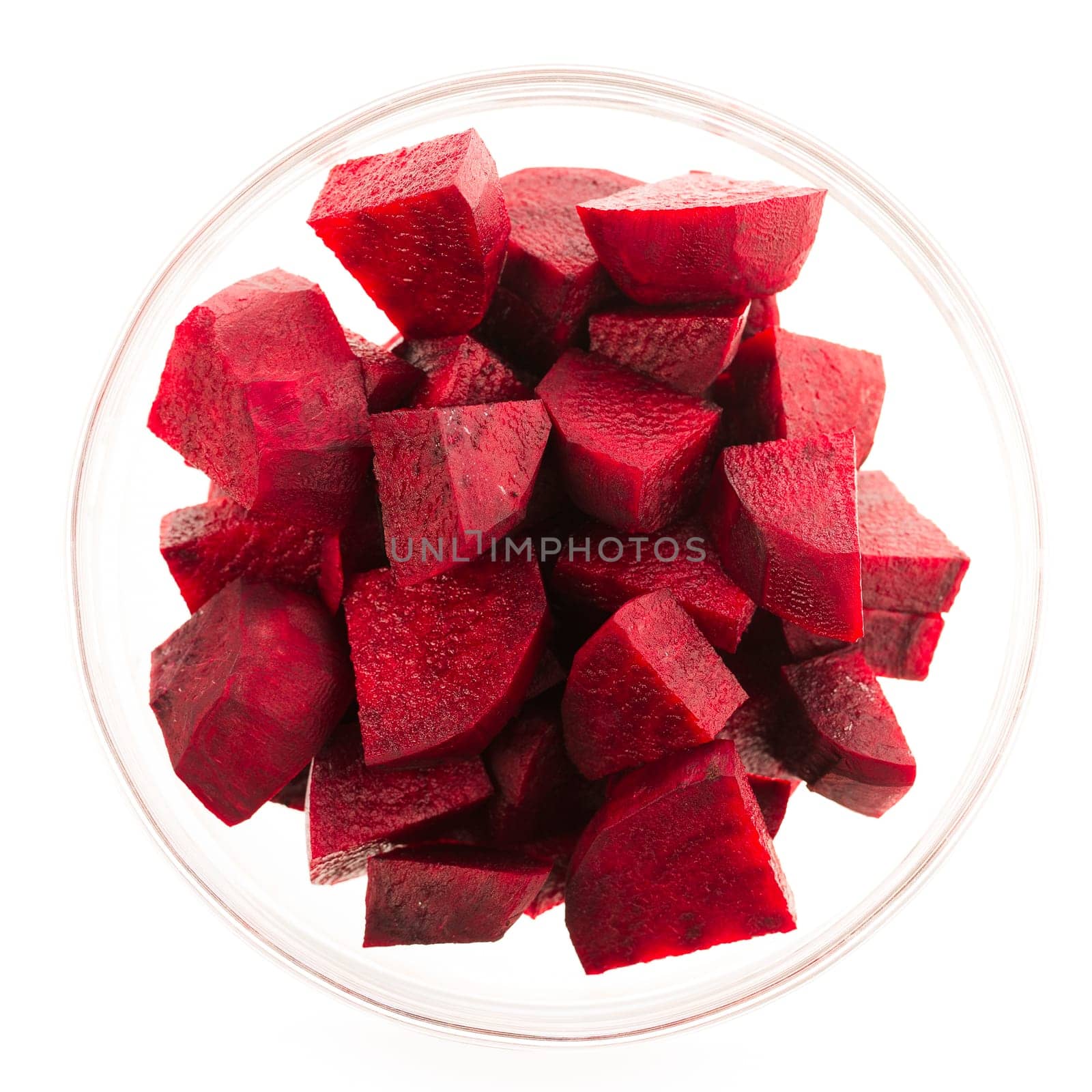 Beetroot wedges in glass bowl isolated on white.
