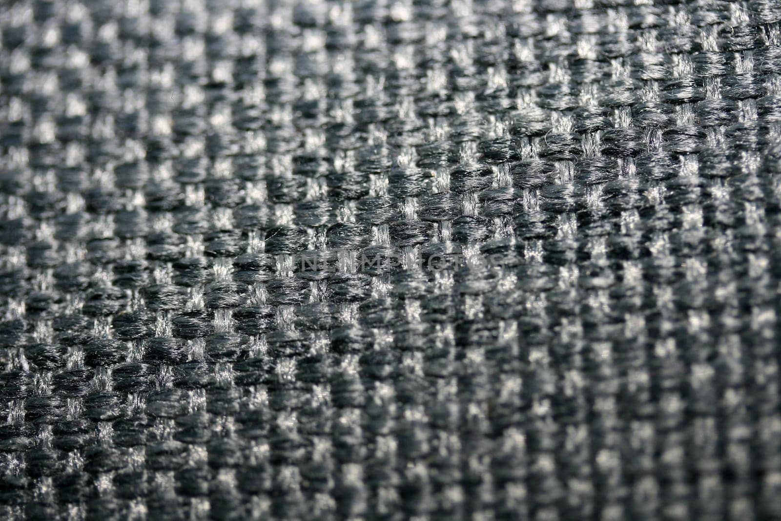 crosswise woven black fabric (synthetic fiber).