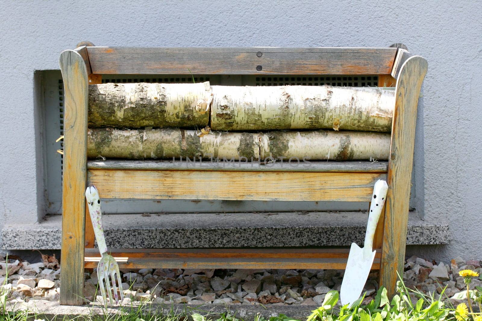 A small wooden bench for garden decoration