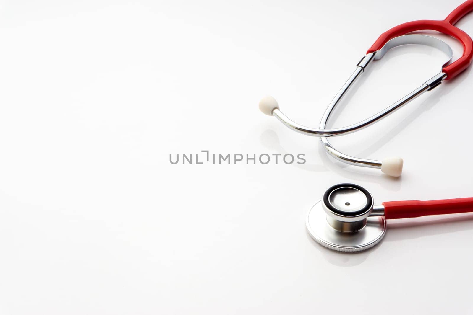 Stethoscope on white background. Healthcare dan Copy Space concept