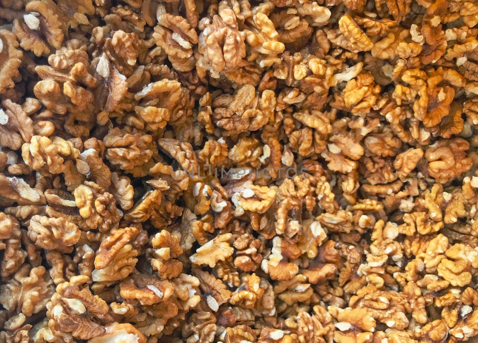 Close-Up Of Peeled Fresh Walnuts Background