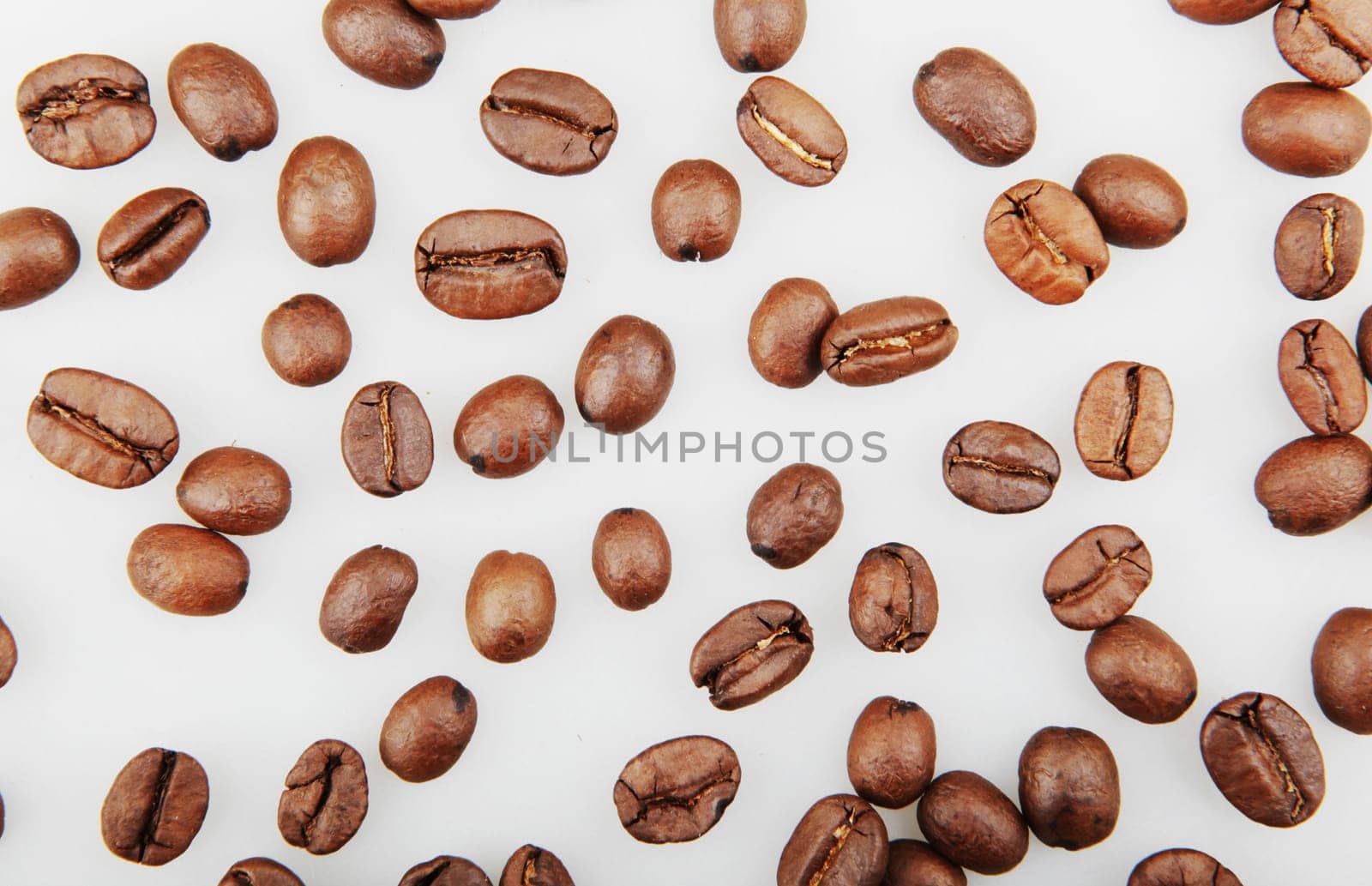 Fresh Roasted Coffee Beans Isolated On White Background