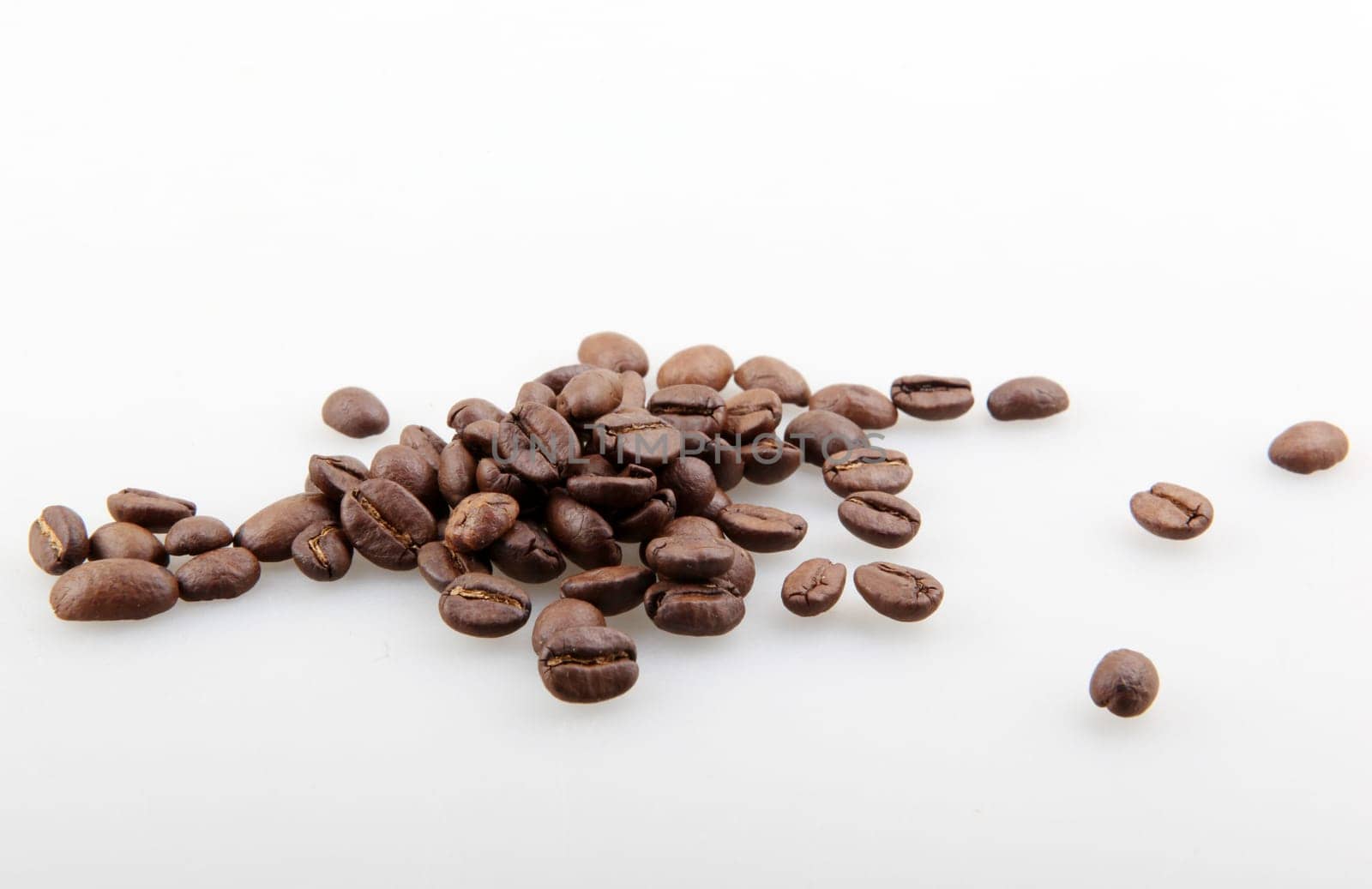 Fresh Roasted Coffee Beans Isolated On White Background