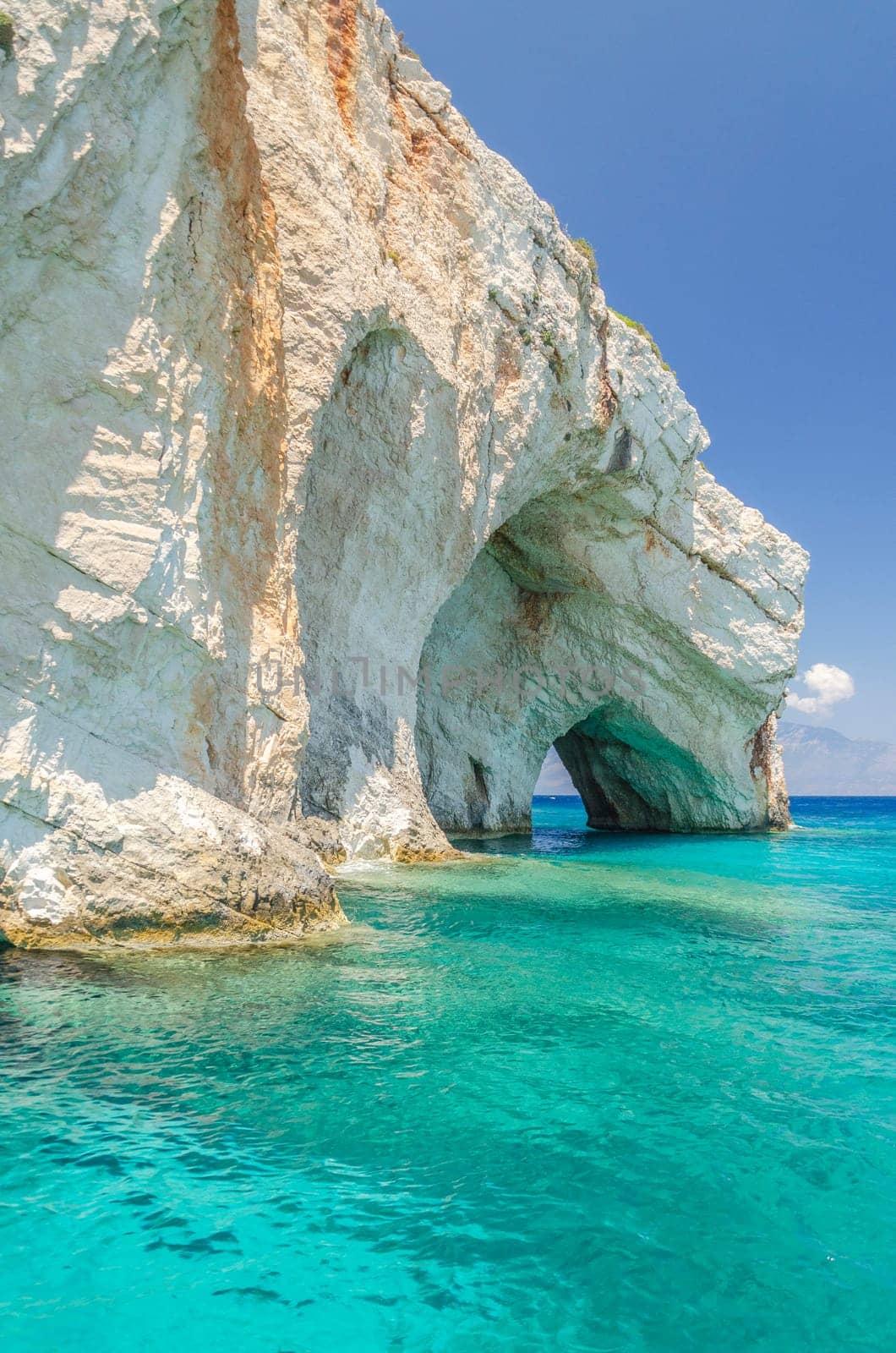 Gorgeous azure waters of blue caves on north east coast of Zakynthos island, Greece