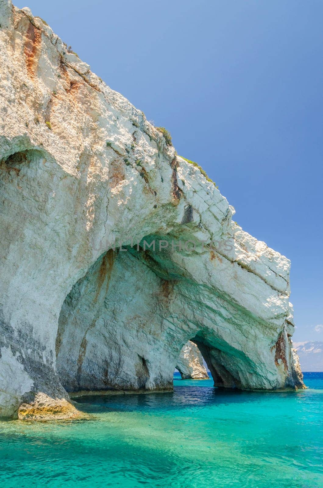 Gorgeous azure waters of blue caves on north east coast of Zakynthos island, Greece