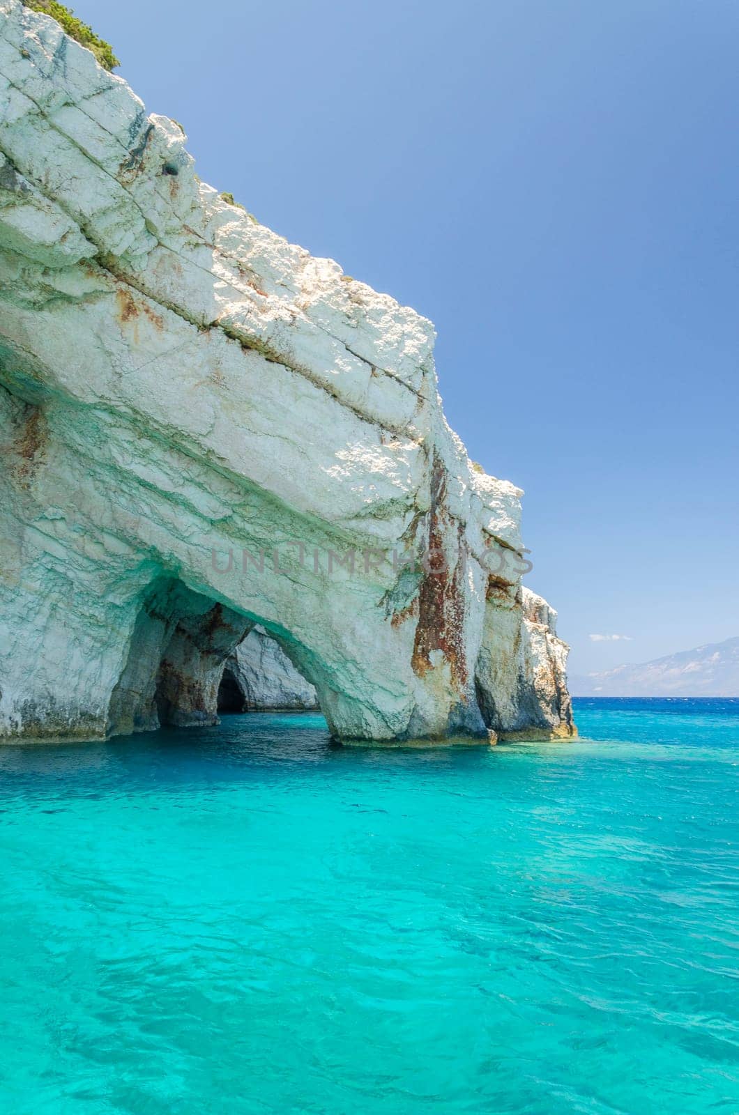 Gorgeous azure waters of blue caves on north east coast of Zakynthos island, Greece