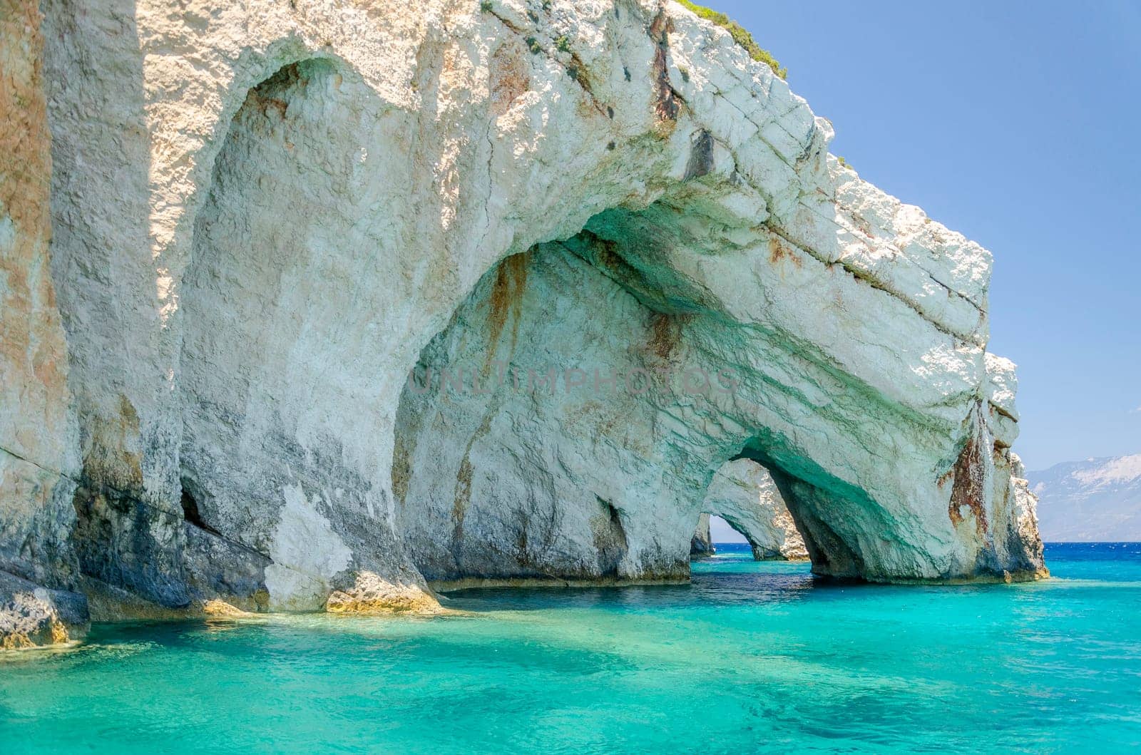 Gorgeous azure waters of blue caves on north east coast of Zakynthos island, Greece