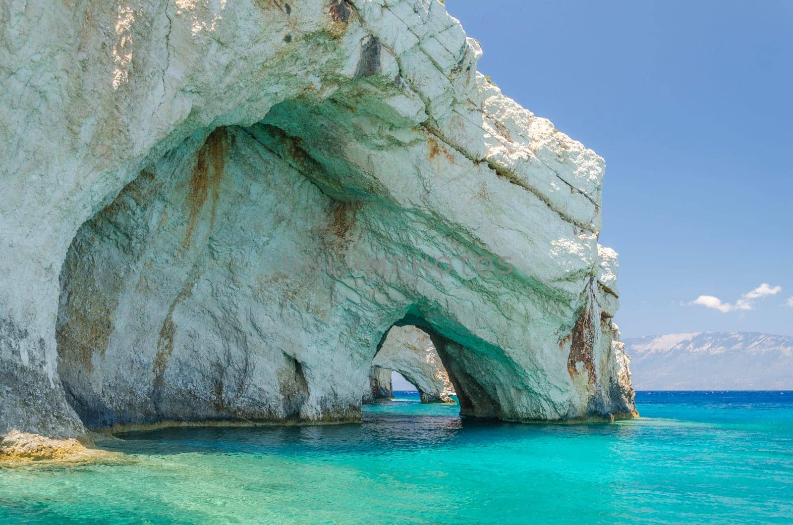 Gorgeous azure waters of blue caves on north east coast of Zakynthos island, Greece
