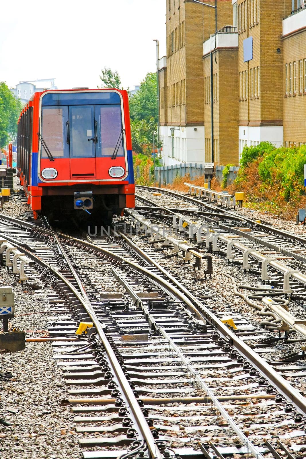 Front view of light rail commuter train .