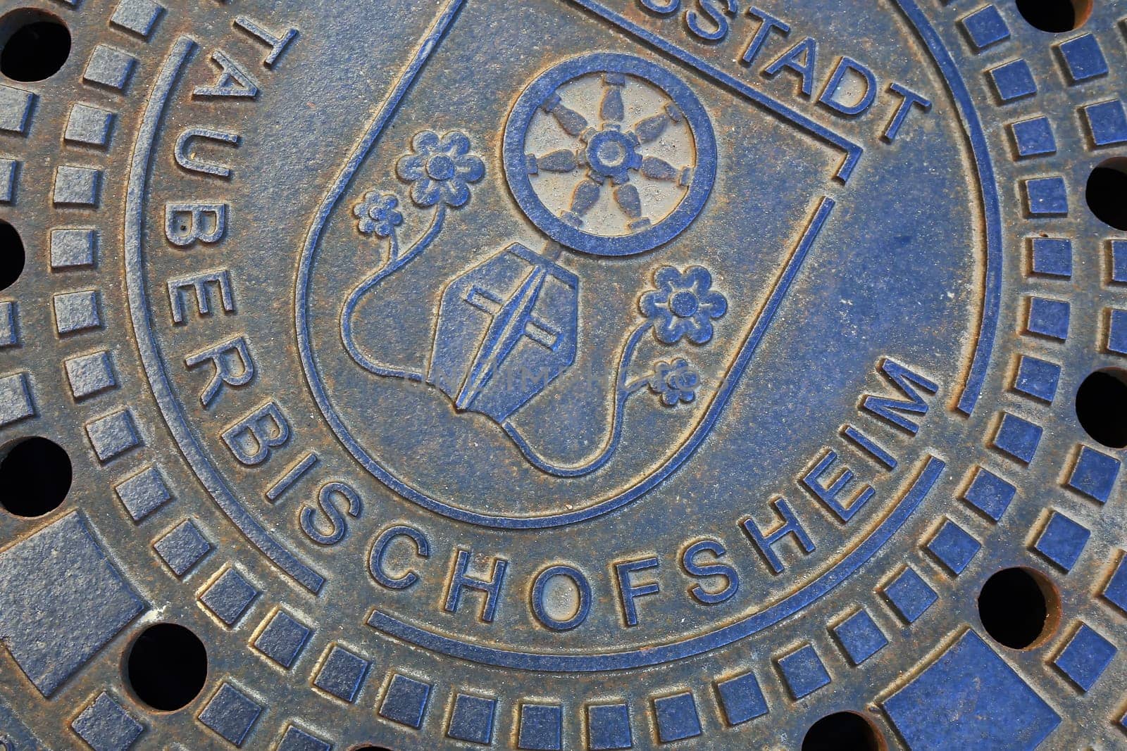 Tauberbischofsheim, Baden-Württemberg / Germany - 13 05 2019: Manhole cover of Tauberbischofsheim with coat of arms