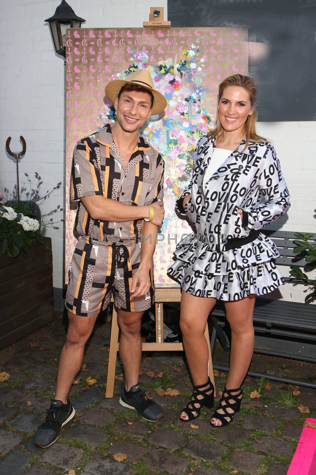 Sebastian Kempin and  Alicja Lisiak ,.during the  Golden Things meets Pink Carpet" pre-closing Finissage at Studio 28   Hamburg"