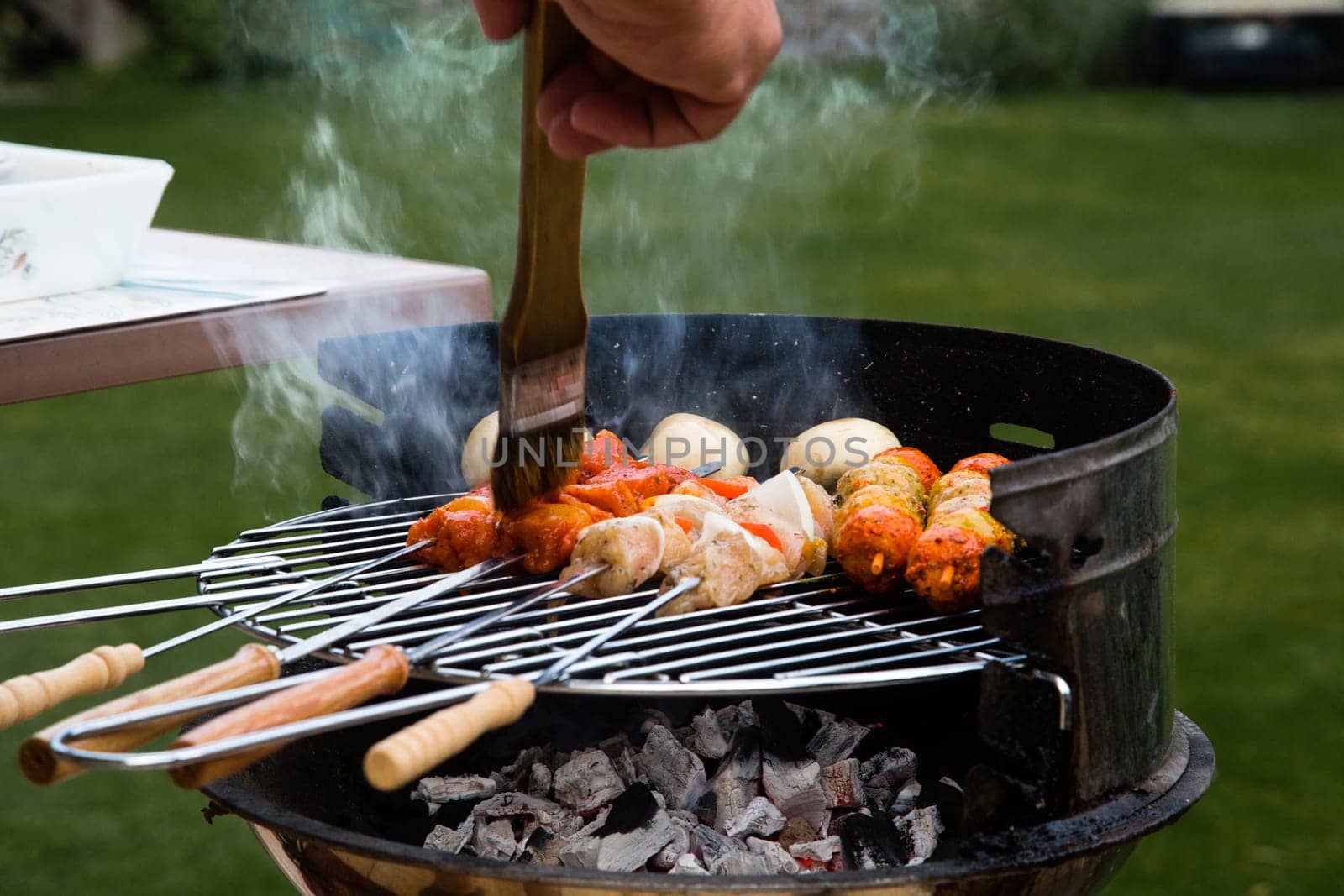 Grilled meat on a summer barbecue in the garden