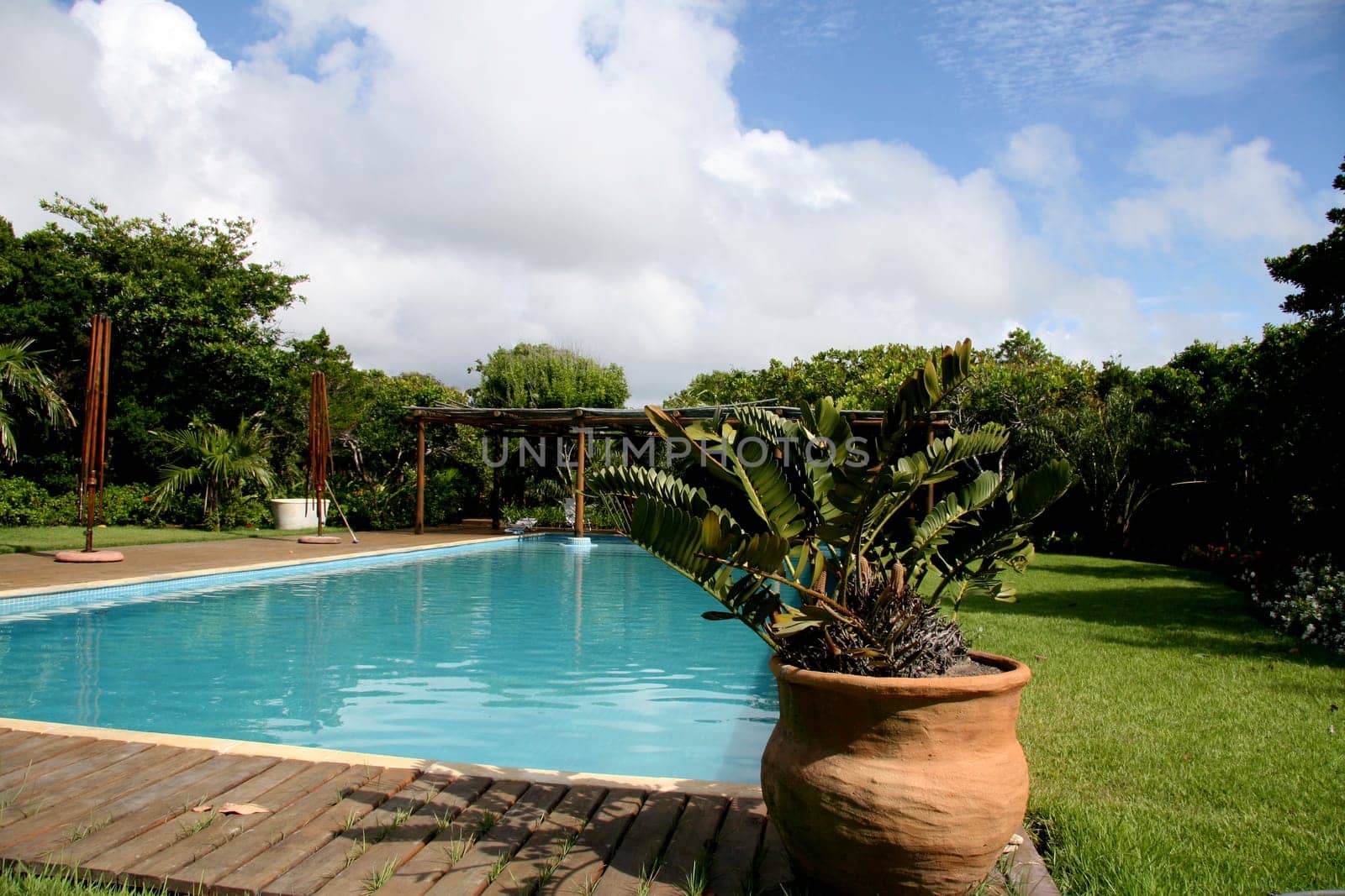porto seguro, bahia / brazil - jeneiro 15, 2008: beach house with a piacava fiber roof is seen in the Trancoso district in the city of Porto Seguro.