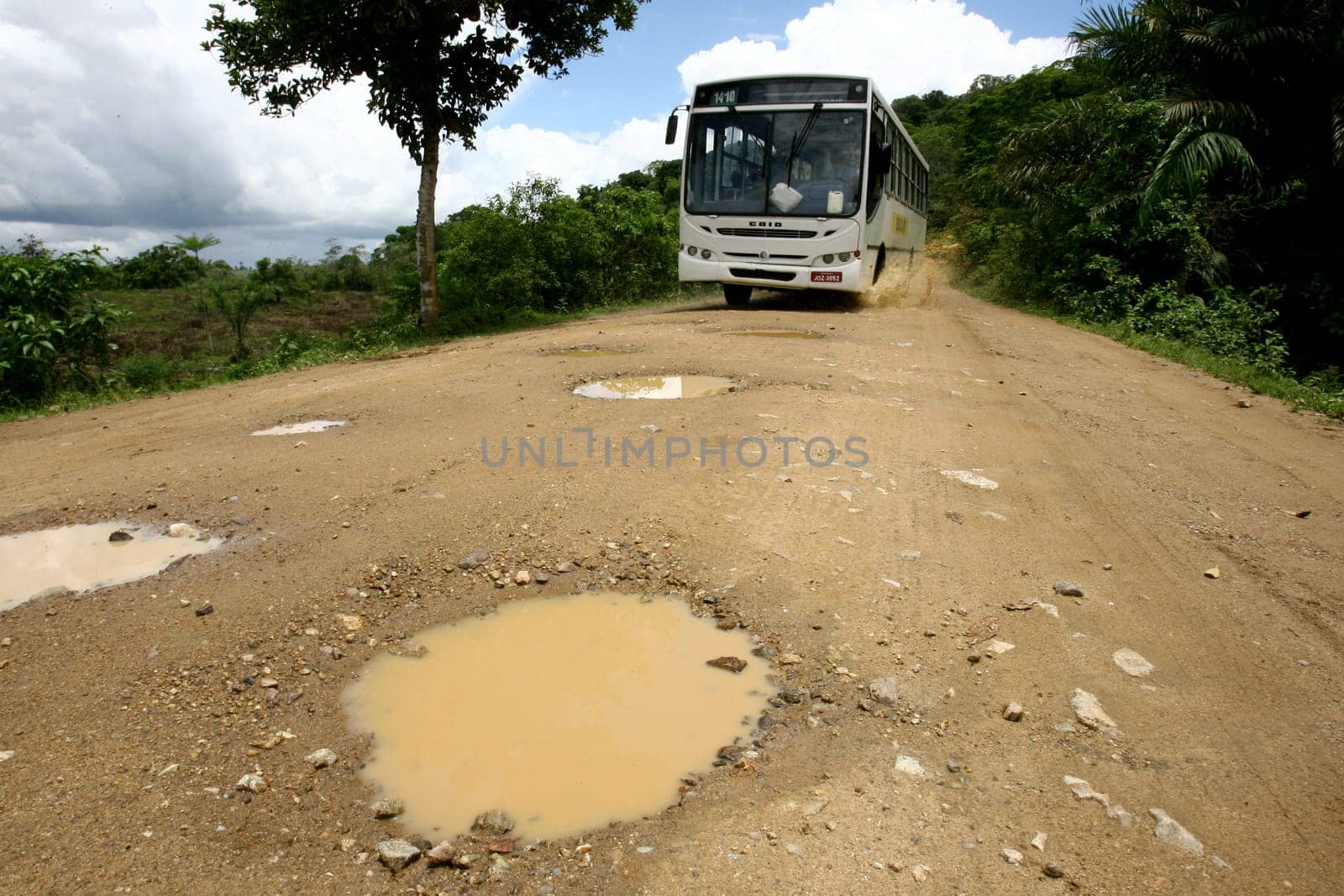 itabuna, bahia / brazil - november 22, 2011: mud and burco are seen on a dirt road leading to the district of Itamaraca, in the municipality of Itabuna, in southern Bahia......