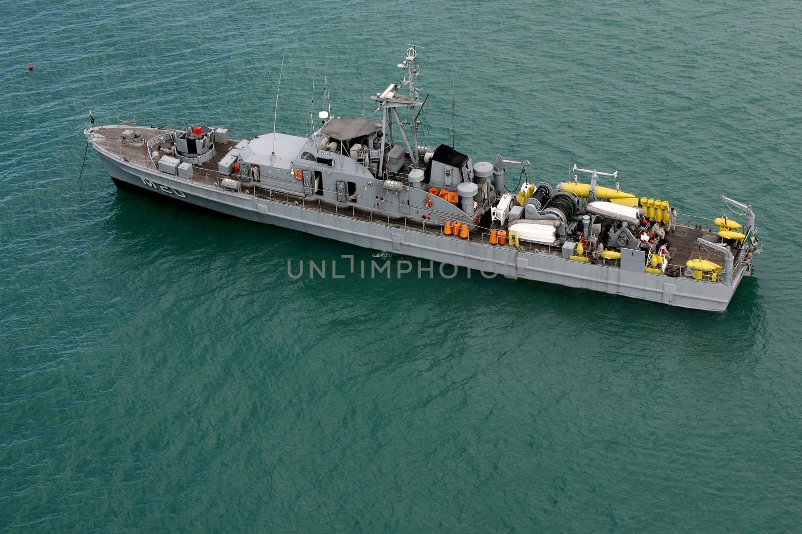 porto seguro, bahia / brazil - february 8, 2011: NV Albardao (M-20) class sweeper ship Aratu, from the Brazilian Navy is seen at sea in the city of Porto Seguro......
