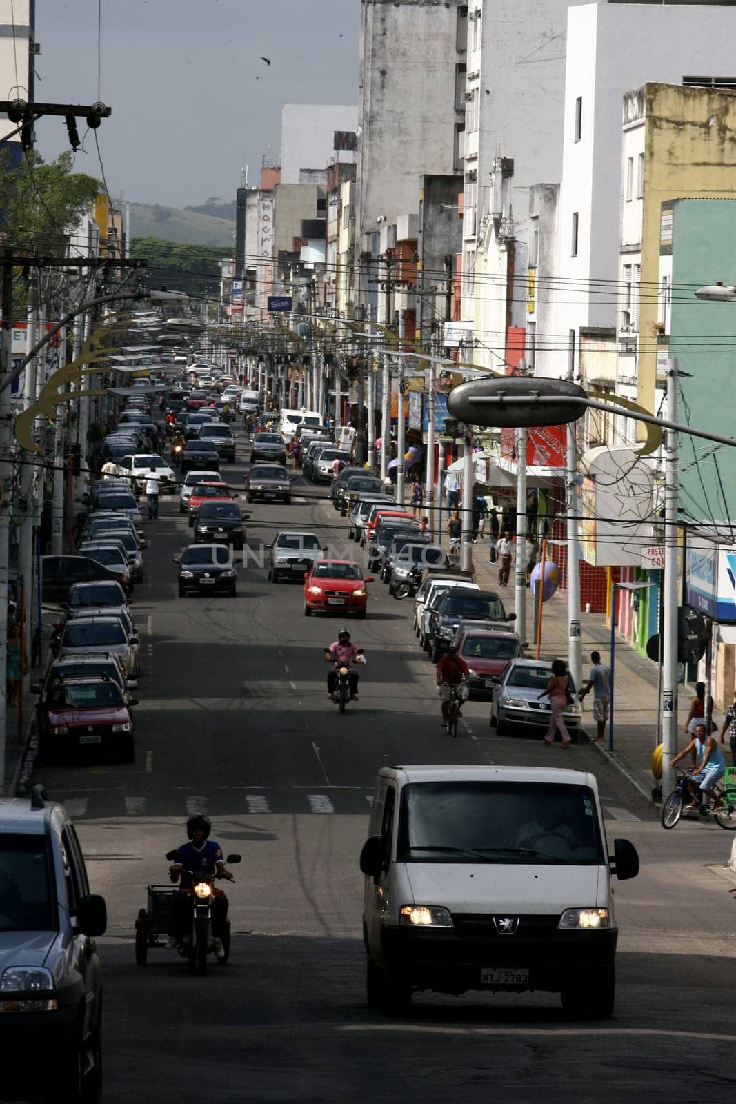 itabuna, bahia / brazil - january 2, 2012: vehicles are seen on the avenue Cinquentenario in the center of Itabuna, southern Bahia.