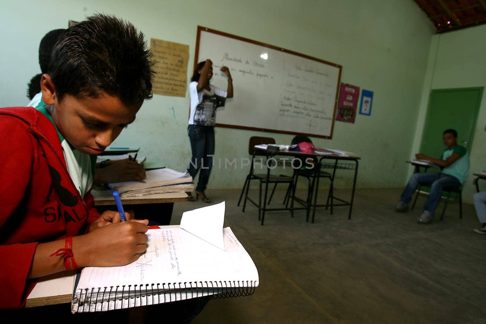 vitoria da conquist, bahia / brazil - october 31, 2011: professors and students are seen in a public school classroom in the city of Vitoria da Conquista.
