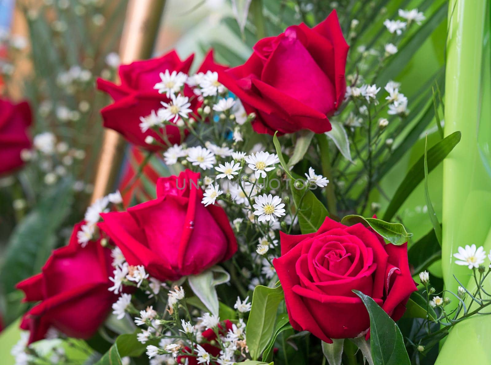 Beautiful bouquet made of roses and other flowers in various colors