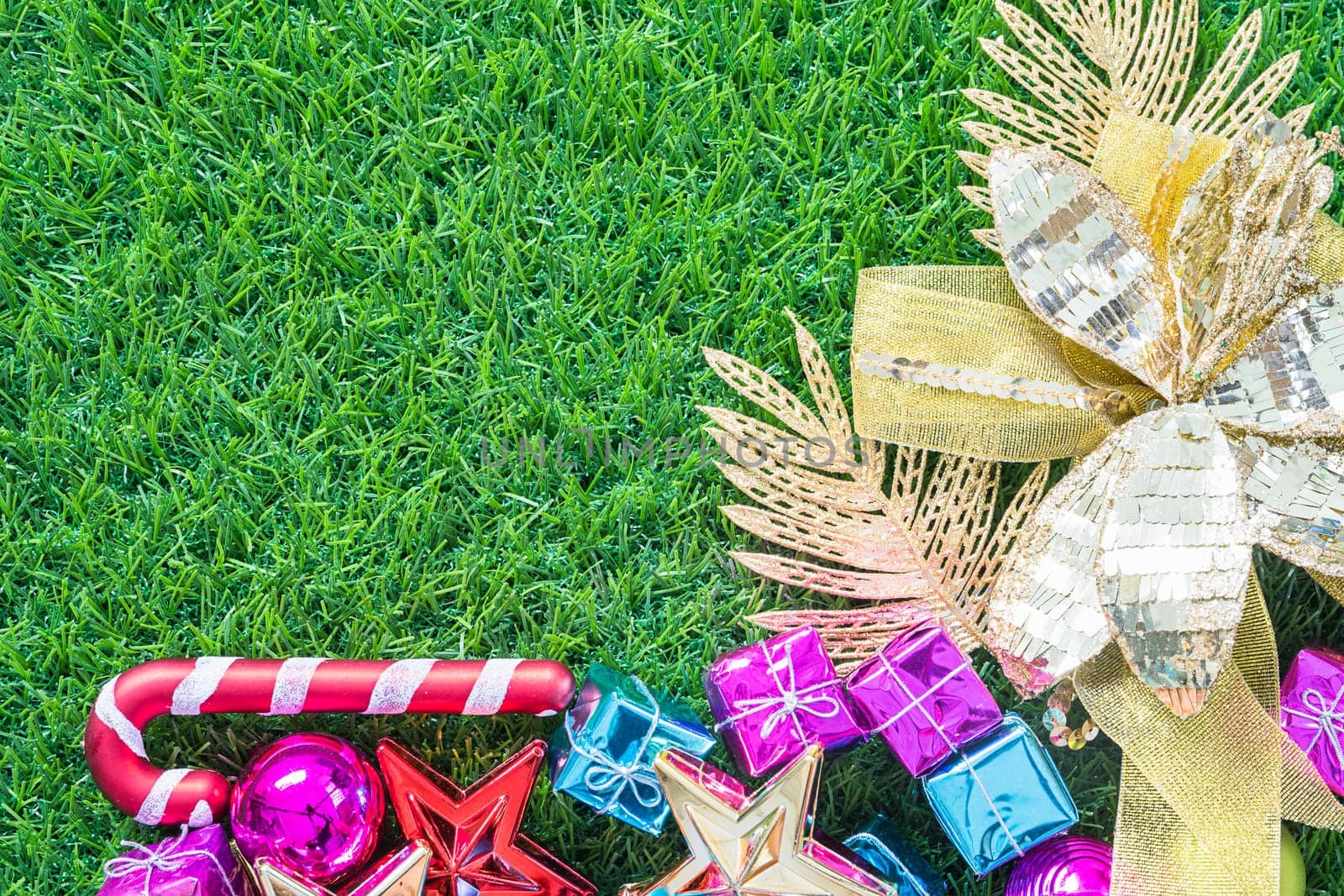 Celebration of New year and Christmas, Top view Christmas decoration on green grass background