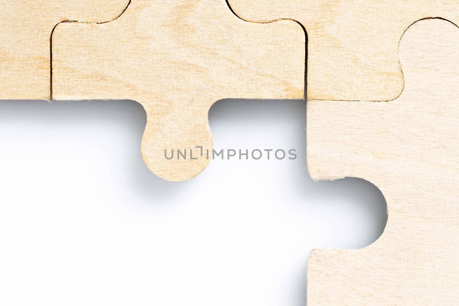 Close up shot of Missing jigsaw puzzle pieces on white background,business concept