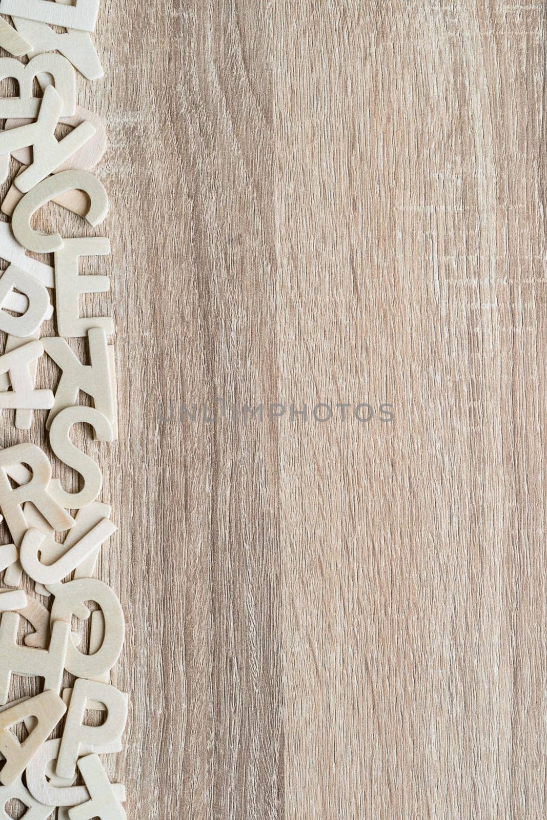 Top view wooden alphabet study english letters,ABC alphabet on wood as a background composition with copy space