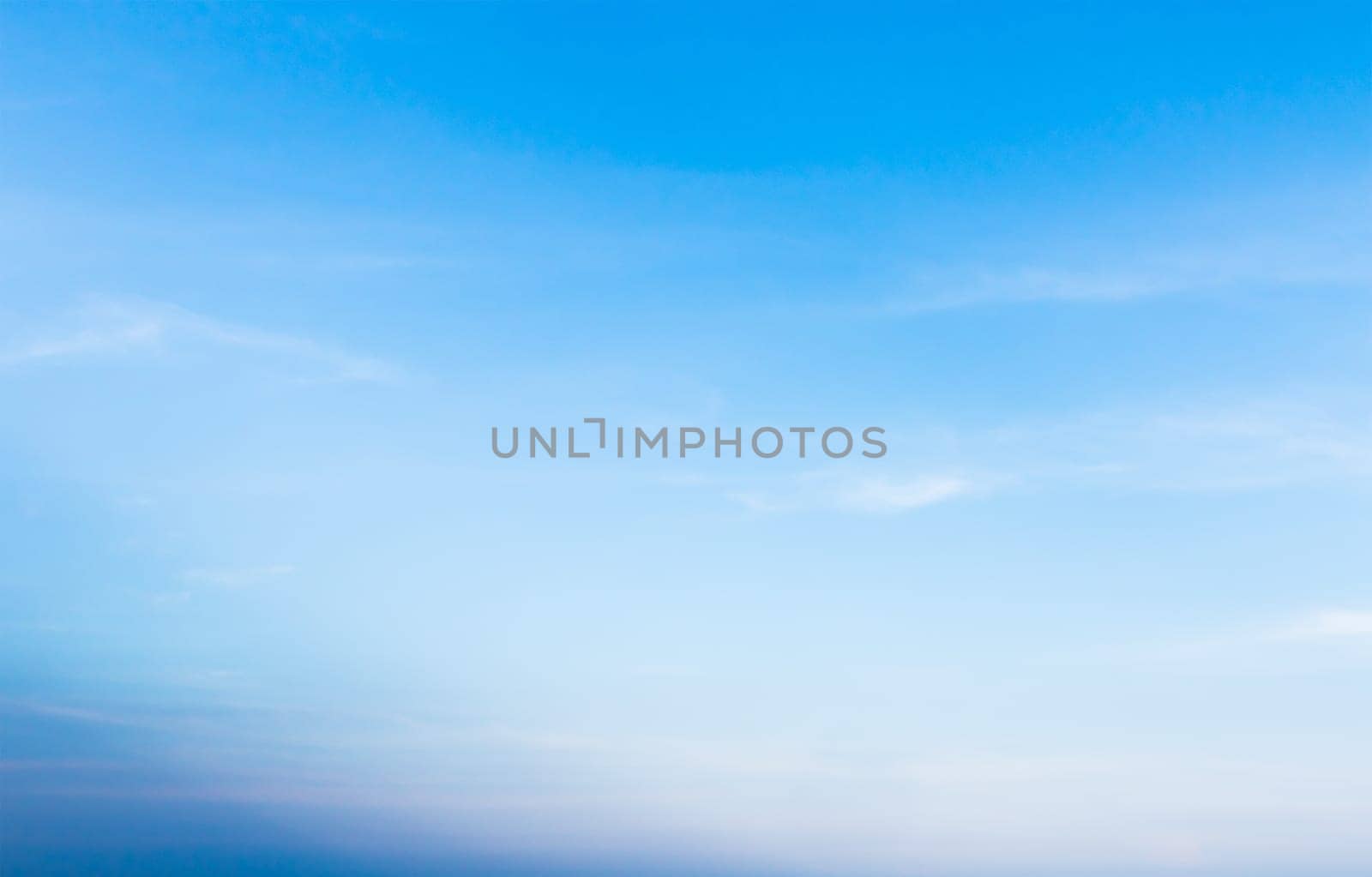 White fluffy clouds in the blue sky, Fantastic soft white clouds against blue sky
