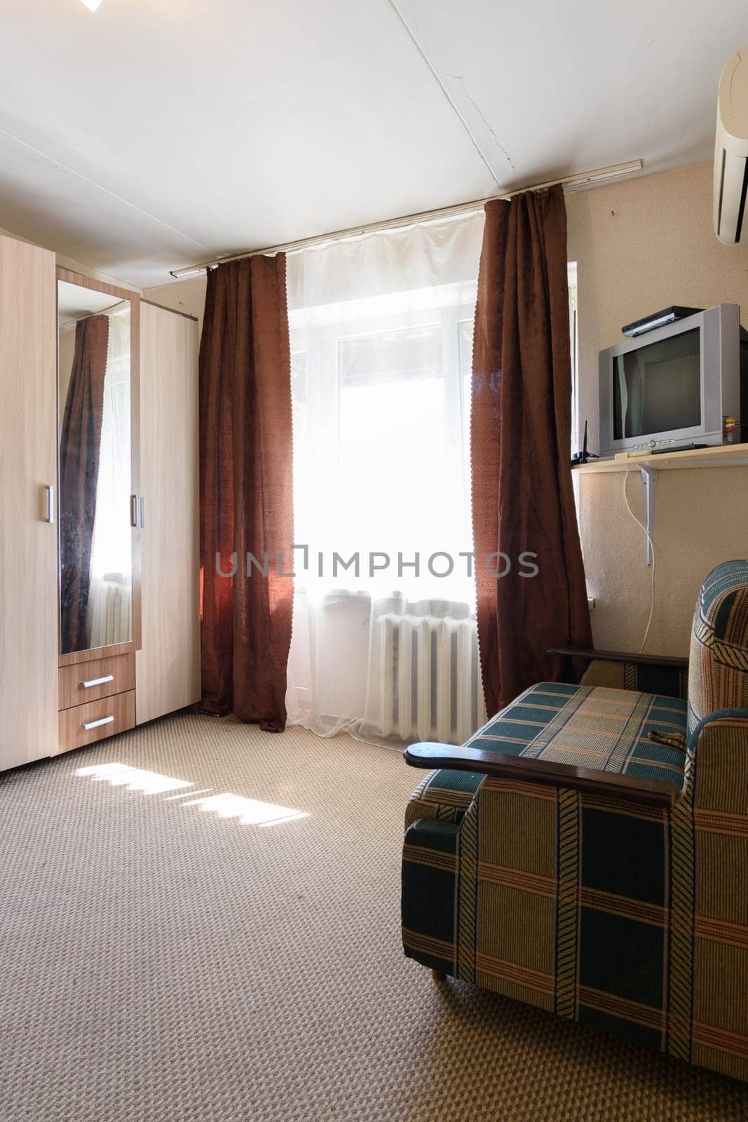 Fragment of the interior of an old apartment with a poor interior