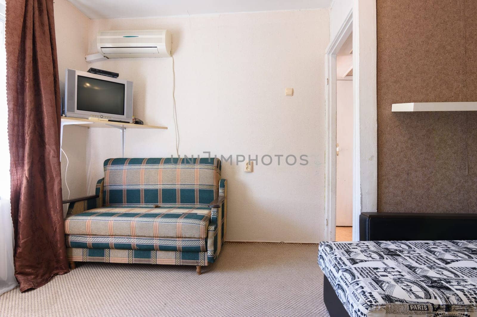Anapa, Russia - June 25, 2020: Poor room interior with outdated old interior