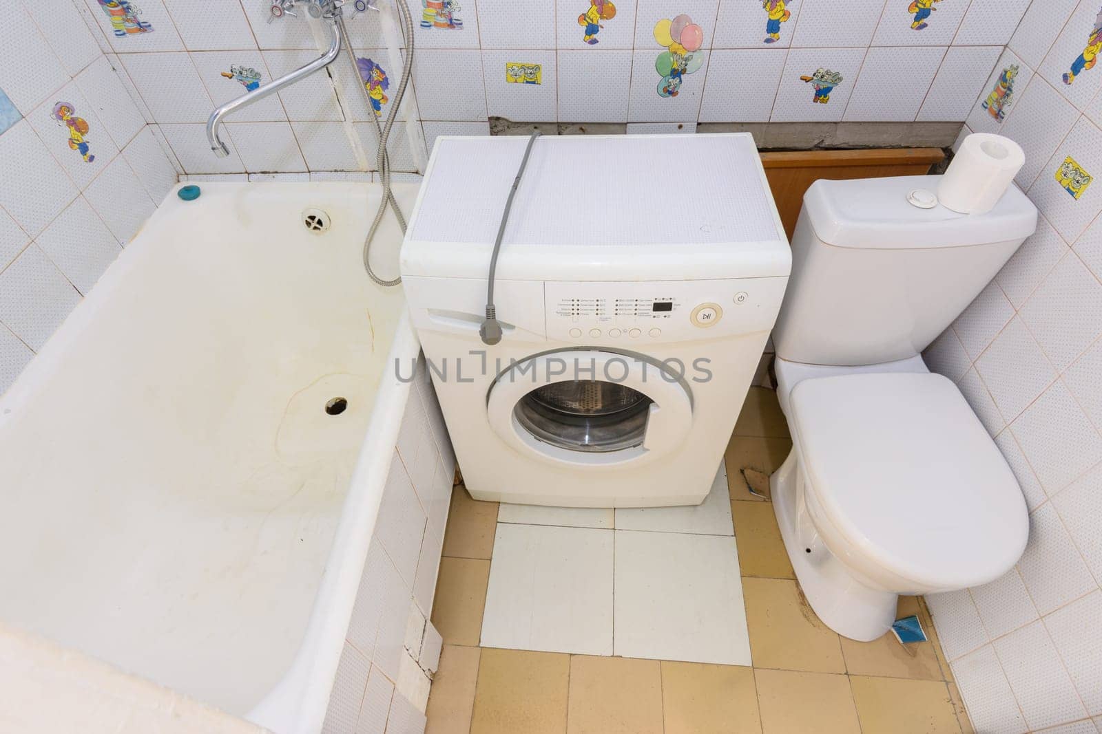 Anapa, Russia - June 25, 2020: The interior of a small old combined bathroom