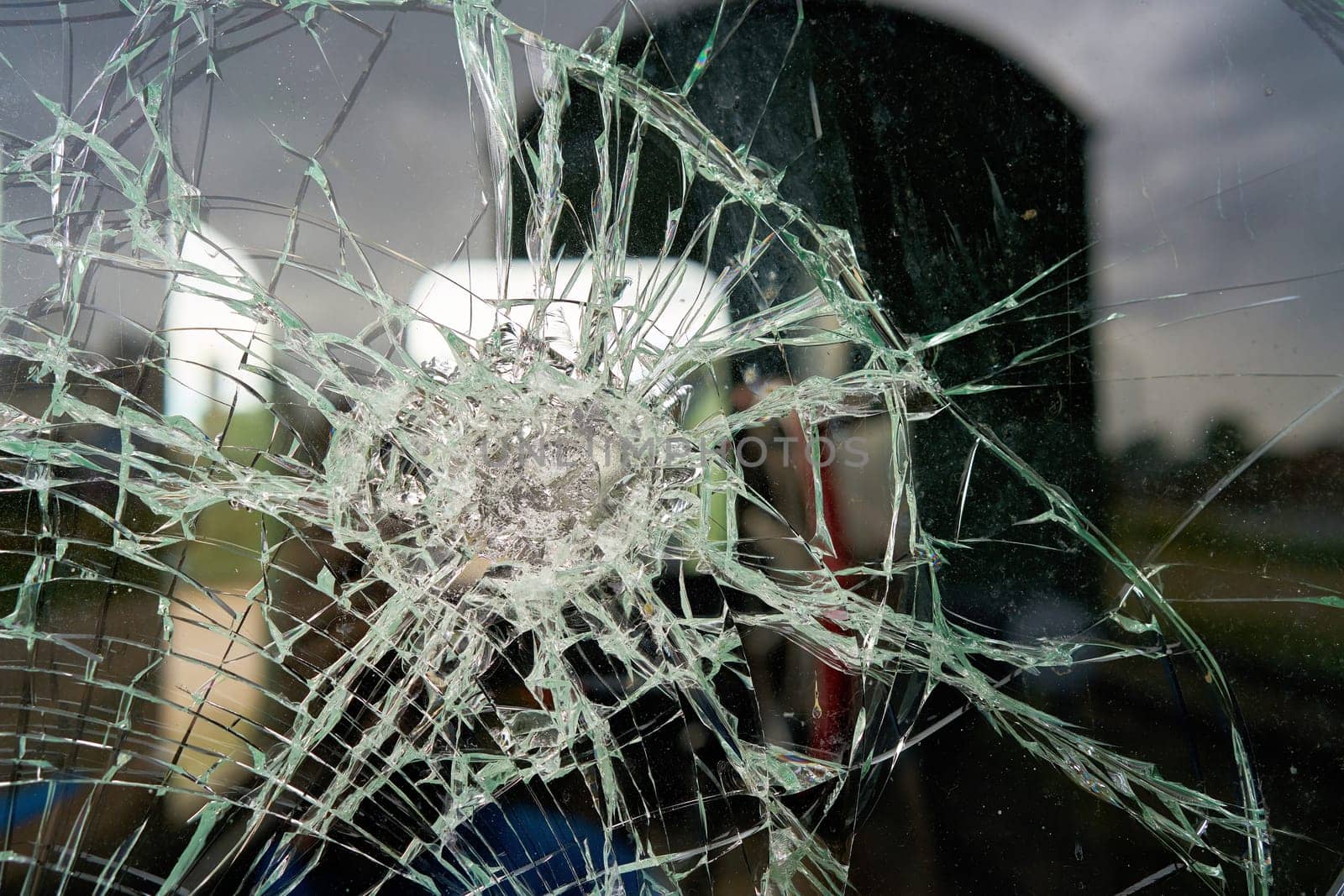 destroyed glass of the window pane of a railway wagon