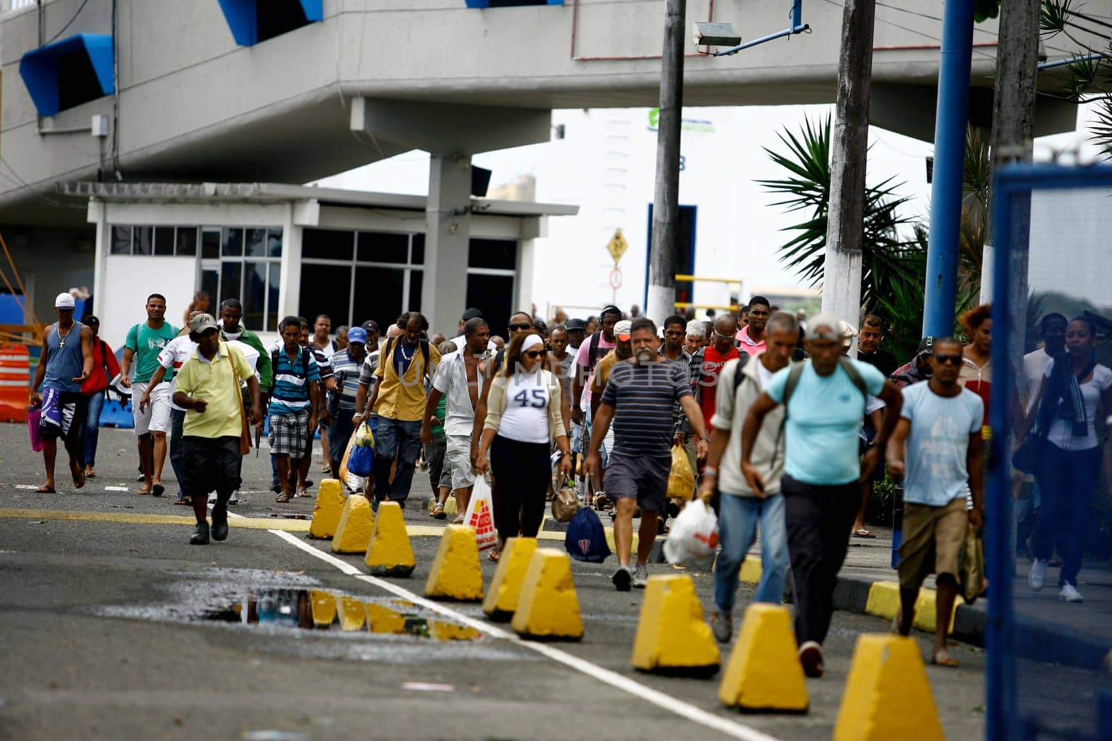 salvador, bahia / brazil - october 3, 2014: passengers disembark at the Terminal de Sao Joaquim in Salvador, after crossing the Baía de Todos os Santos on the island of Itaparica.