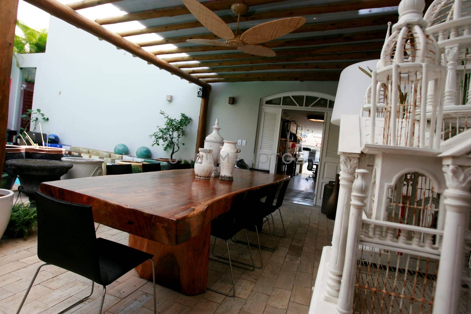 salvador, bahia / brazil - december 26, 2014: house decorated with teak (or teka) table. environment on display in a store in the city of Salvador...