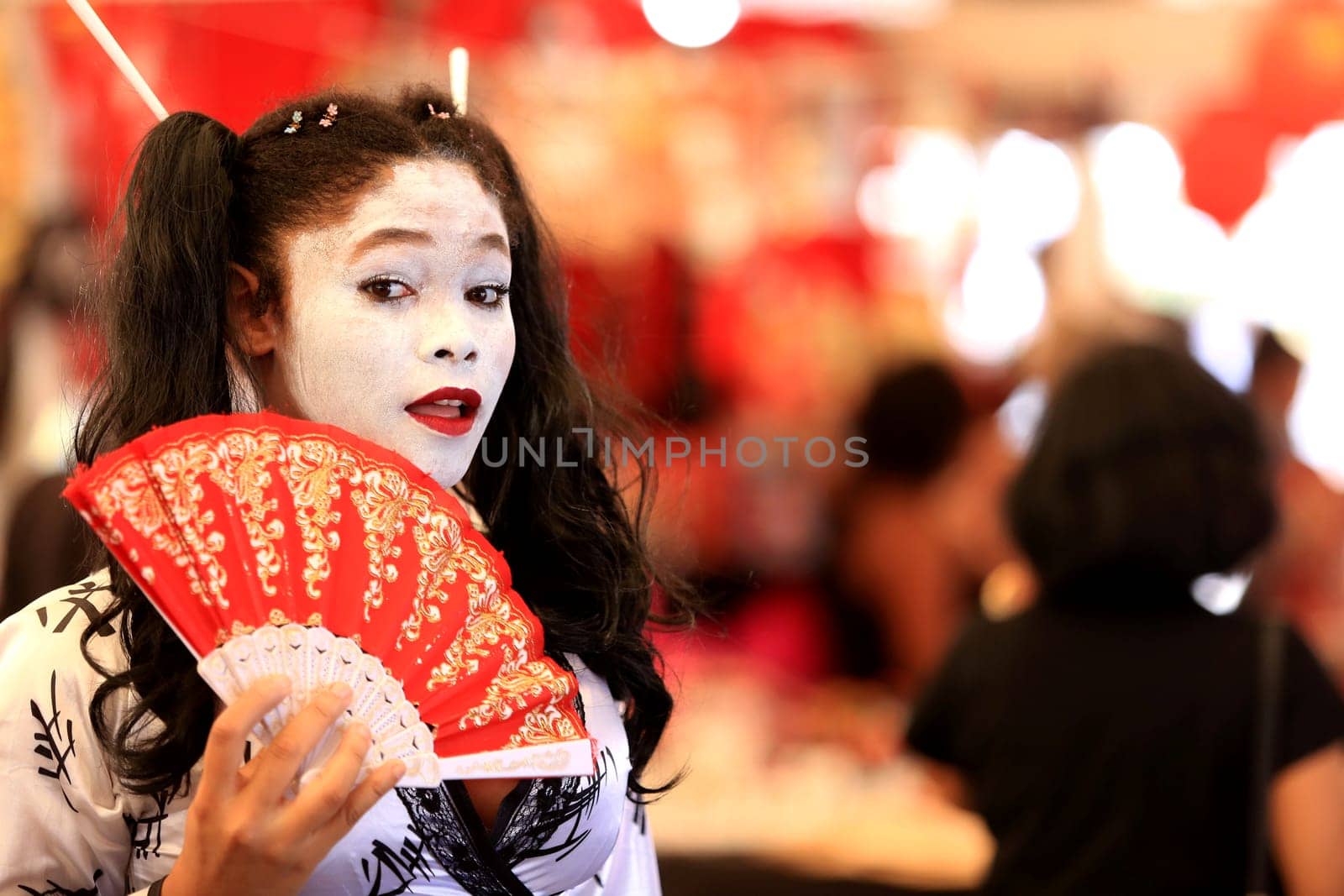 salvador, bahia / brazil - august 27, 2016: people are seen in store stand during japanese culture party at Parque de Exposicoes in the city of Salvador.