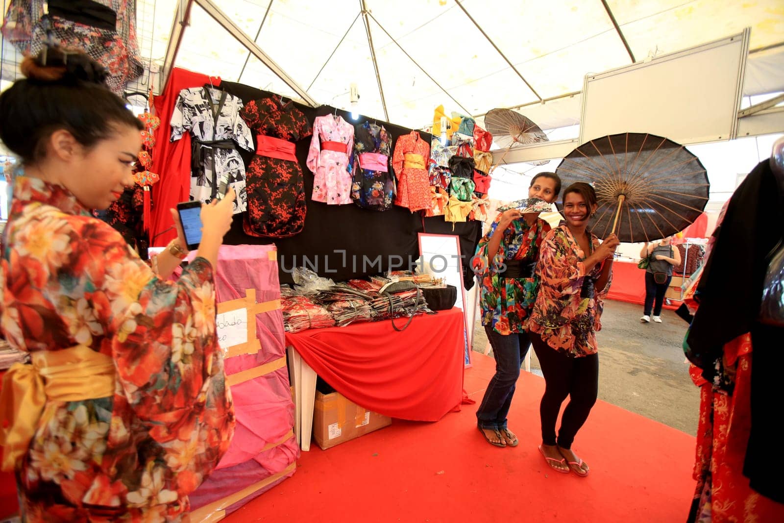 salvador, bahia / brazil - august 27, 2016: people are seen in store stand during japanese culture party at Parque de Exposicoes in the city of Salvador.