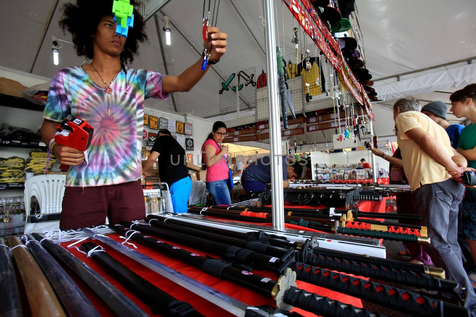 salvador, bahia / brazil - august 27, 2016: people are seen in store stand during japanese culture party at Parque de Exposicoes in the city of Salvador.