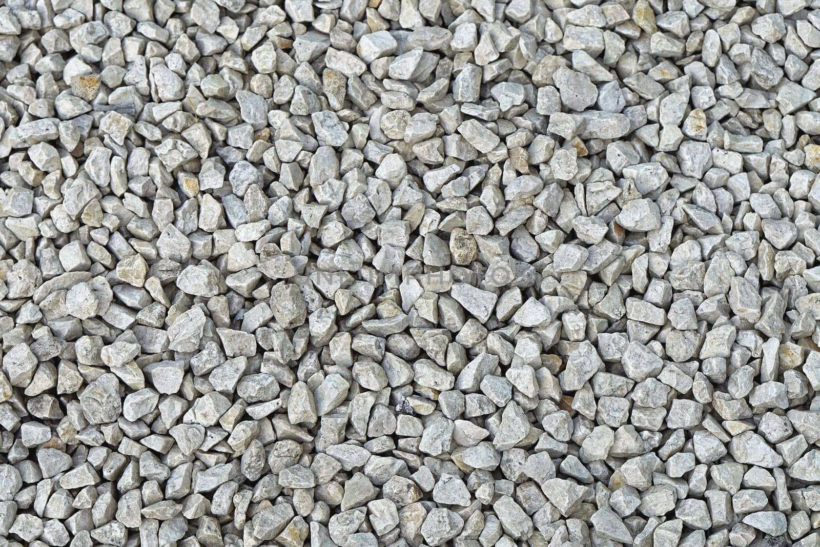 White gravel stones background texture