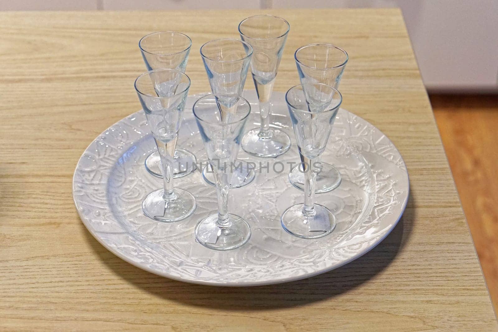 Six shot spirit drinks glasses at tray