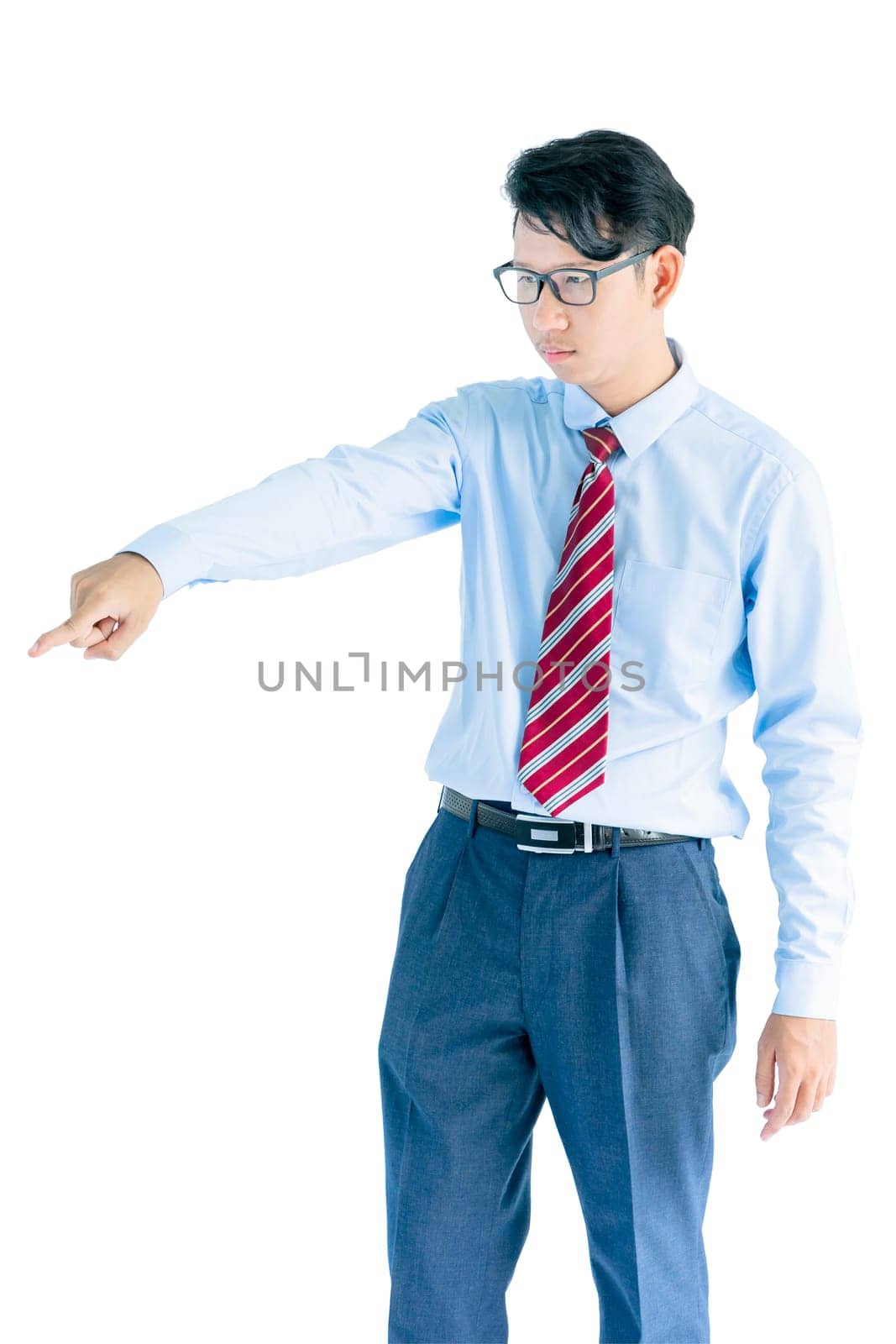 Male wearing blue shirt and red tie reaching posing in studio isolated on white background with clipping path