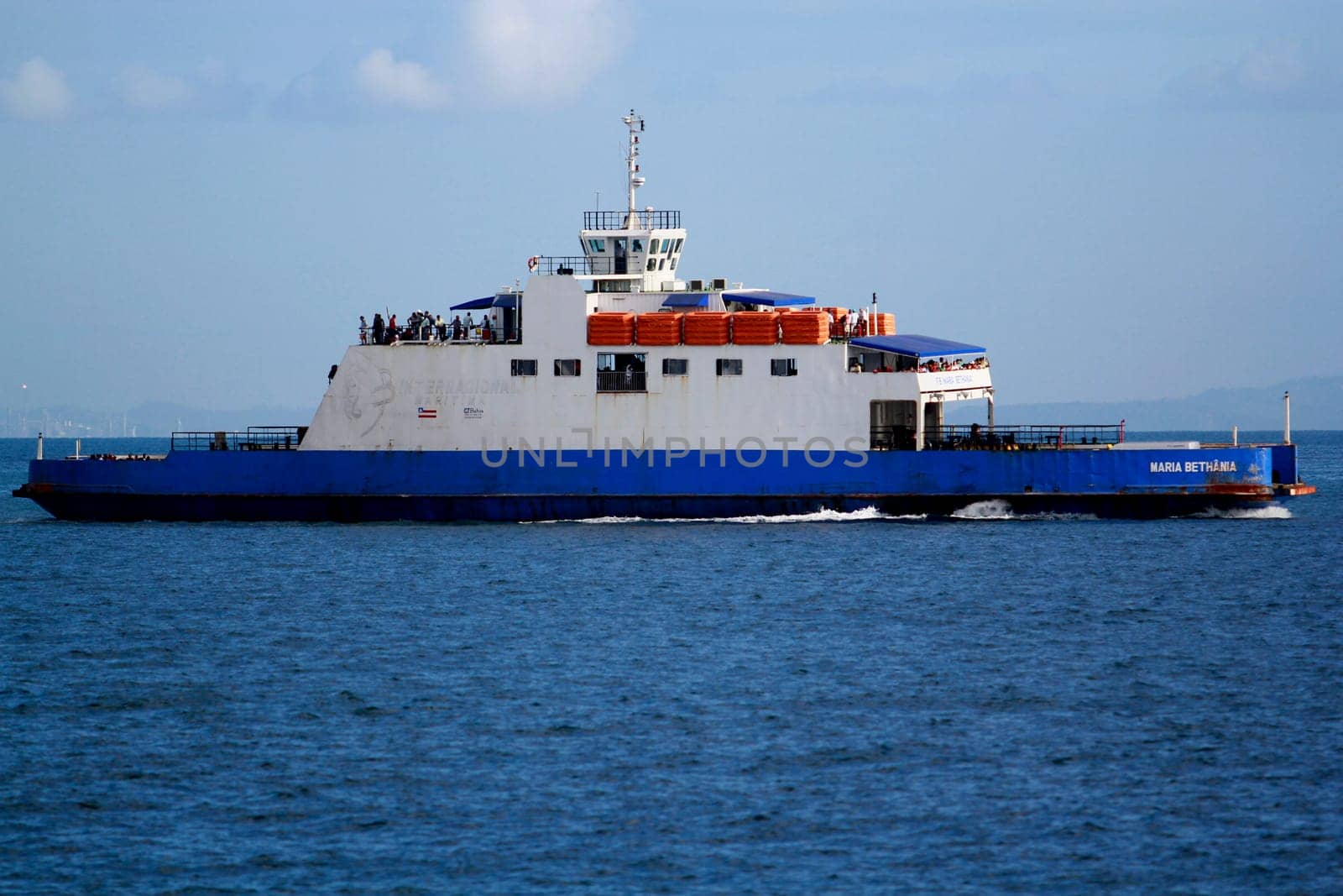 salvador, bahia / brazil - november 3, 2014: Rio Paraguacu ferry boat is seen sailing through Baia de Todos os Santos during crossing from Itaparica Island to the city of Salvador.