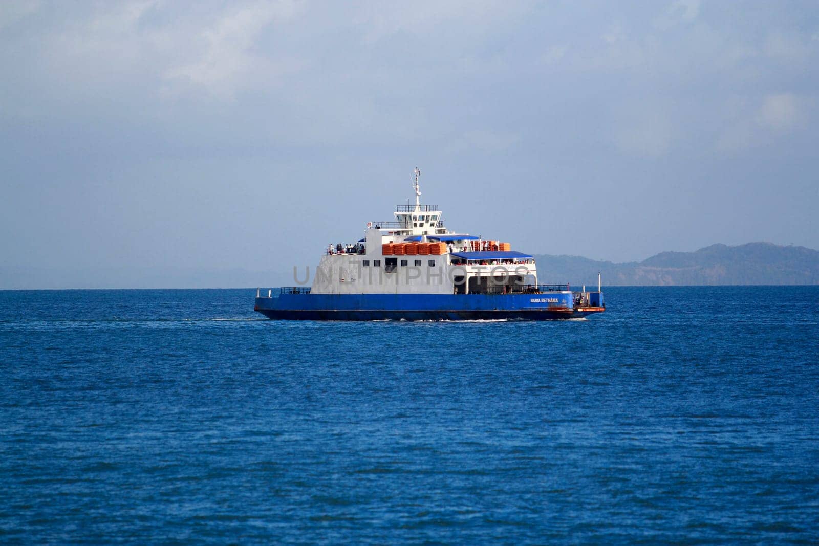salvador, bahia / brazil - november 3, 2014: Rio Paraguacu ferry boat is seen sailing through Baia de Todos os Santos during crossing from Itaparica Island to the city of Salvador.