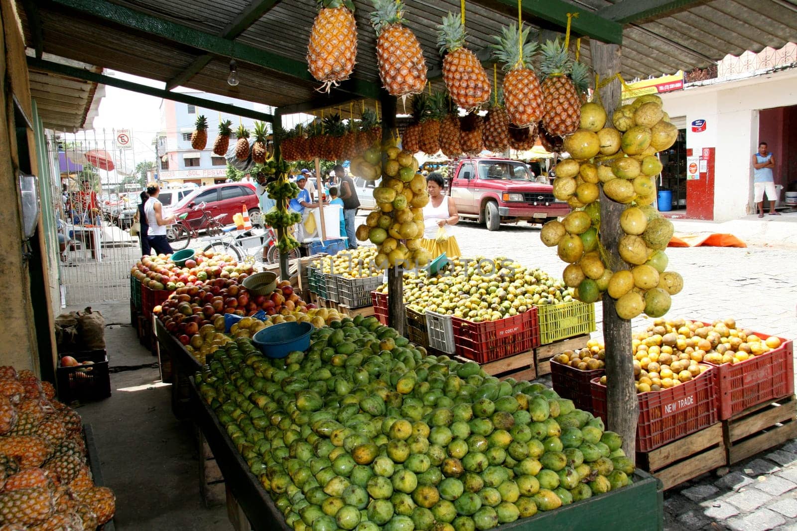 eunapolis, bahia / brazil - december 29, 2007: fruits are seen for sale at an open market in the city of Eunapolis.......