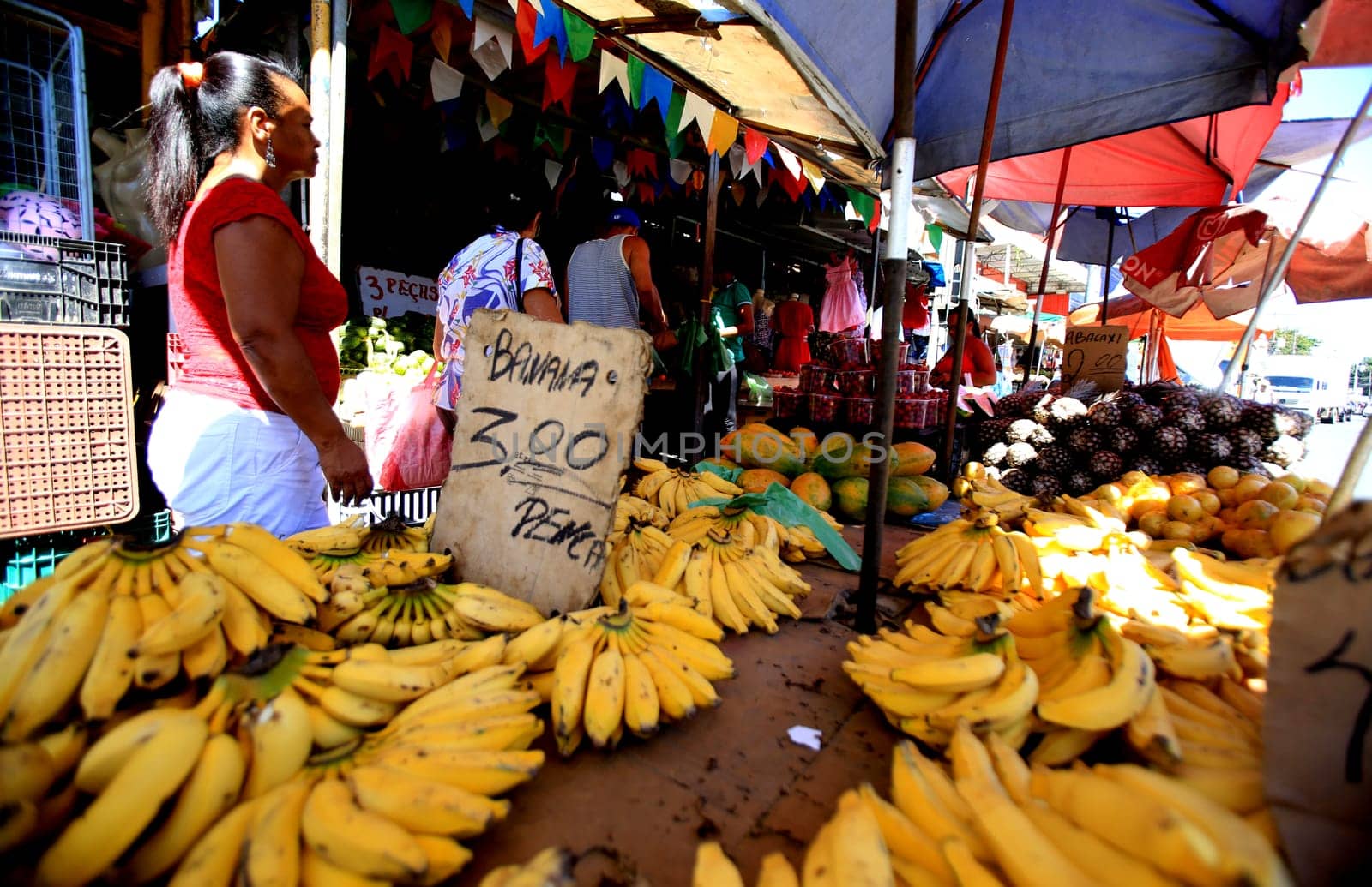 salvador, bahia / brazil - august 9, 2016: bananas are seen for sale at an open market in the city of Salvador.