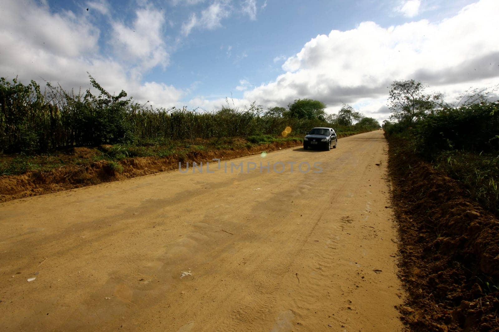 vitoria da conquista, bahia / brazil - october 28, 2011: dirt road connecting the district of Igua to the city center of Vitoria da Conquista.