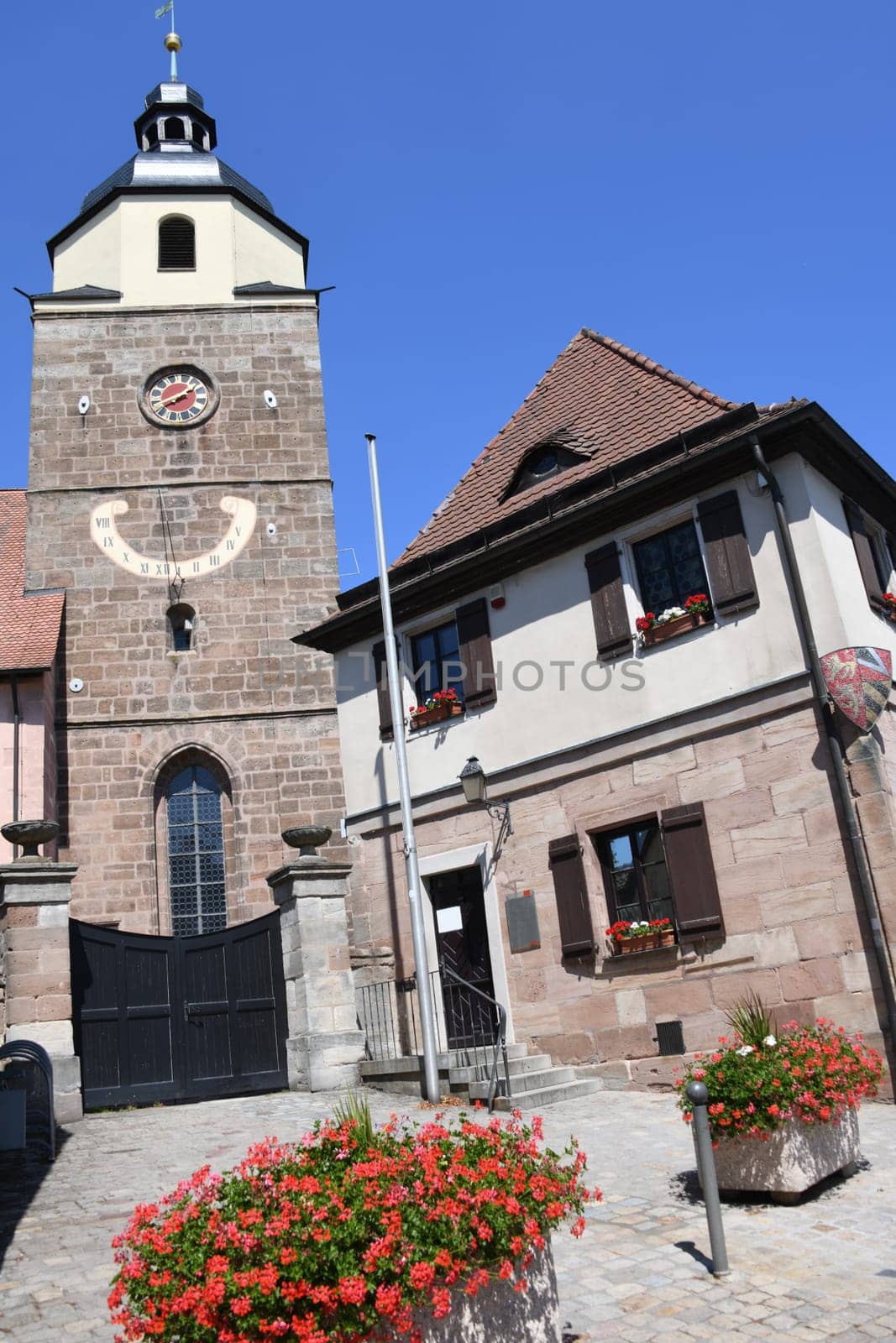 The town hall,Bürgeramt-Nord in the district of Nuremberg Großgründlach with the ev.-luth church St. Laurentius
