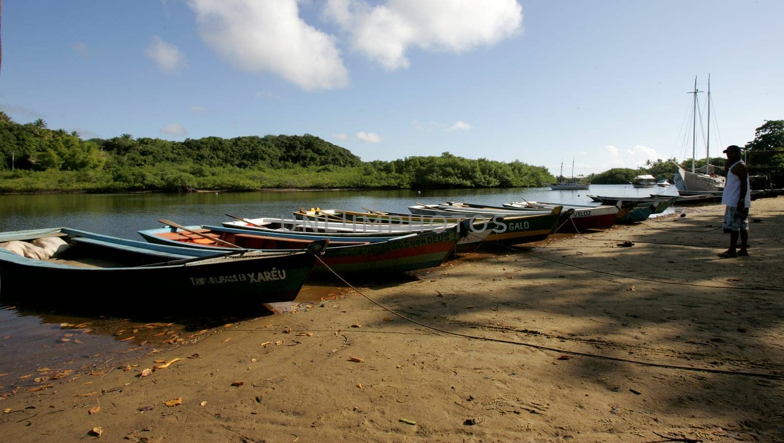 porto seguro, bahia / brazil - february 26, 2011: Boats are seen in the Rio Caraiva district of the city of Porto Seguro, in southern Bahia.