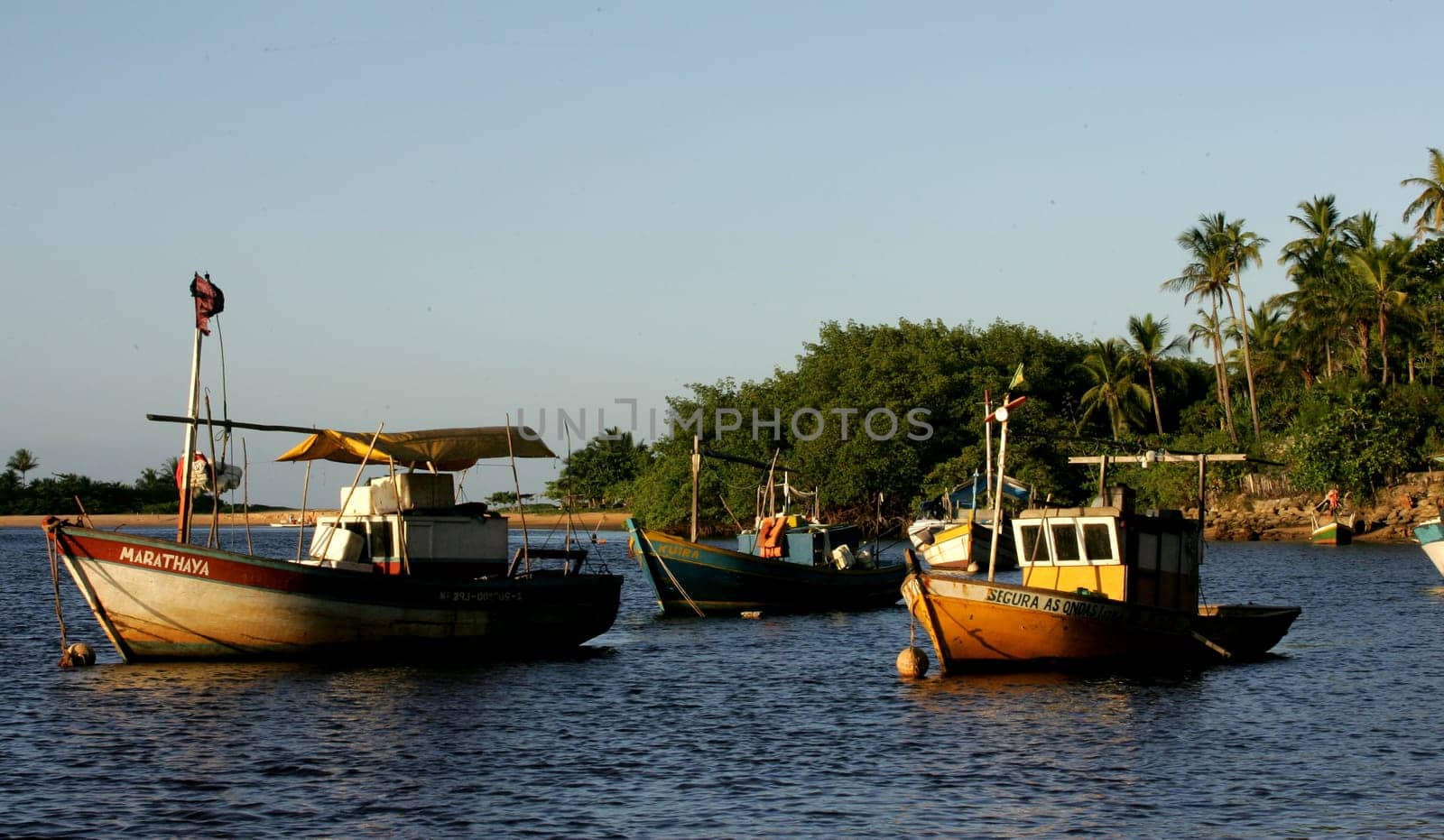 porto seguro, bahia / brazil - february 26, 2011: Boats are seen in the Rio Caraiva district of the city of Porto Seguro, in southern Bahia.
